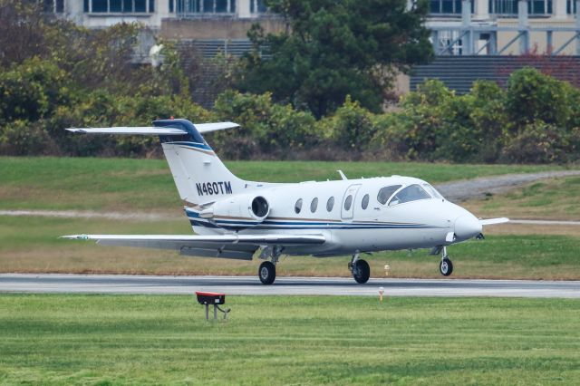 Beechcraft Beechjet (N460TM) - N460TM is a 2007 Hawker 400A seen here landing at Atlanta's PDK executive airport. I shot this with a Canon 500mm lens. Camera settings were 1/2000 shutter, F$, ISO 640. Please check out my other photography. Votes and positive comments are always appreciated. Questions about this photo can be sent to Info@FlewShots.com