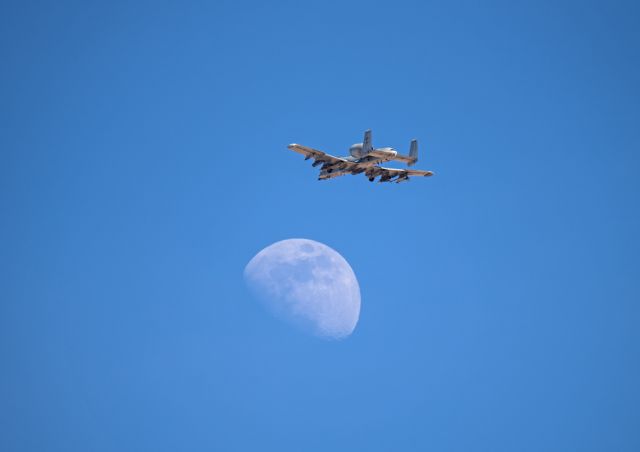 N216 — - An A-10C of the 75th Fighter Squadron, Moody AFB, GA, reaches for the moon on a Red Flag training mission.