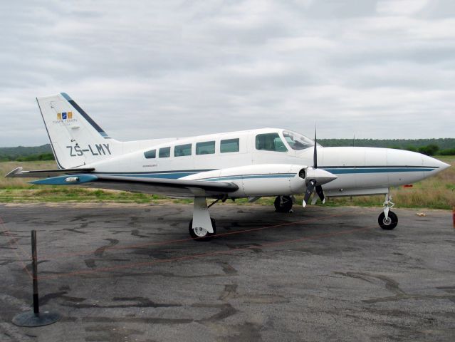 ZS-LMY — - At the MalaMala game lodge. An electric fence around the aircraft to prevent Hyena to chew on tires and brake lines.