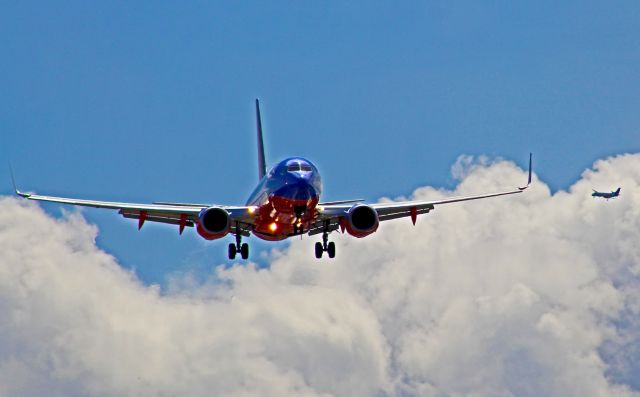 Boeing 737-700 — - Taken in July 2017, this Southwest 737-700 is on short final for runway 8 at Pensacola International, while a Saab 340B of Silver Airways arriving from Tampa follows it.