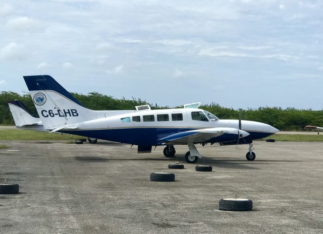 Cessna 402 (C6-LHB) - MYLD parking lot.