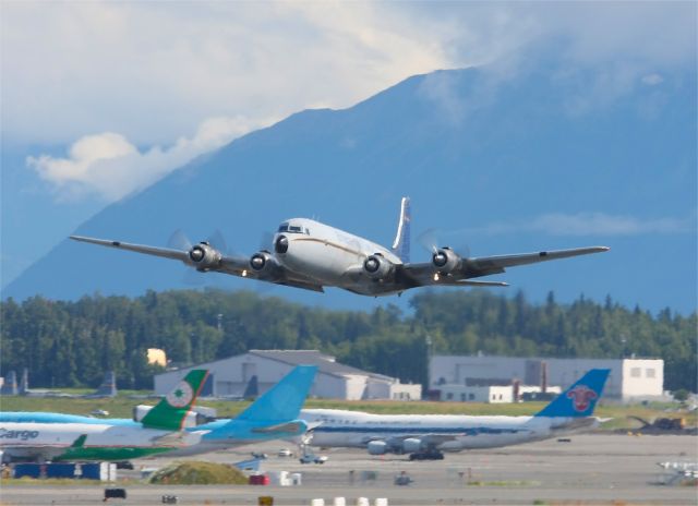 Douglas DC-6 (N151) - Everts DC-6, N151 lifts off from Anchorage on another freight run to the Alaska wilderness ( August 2010 )