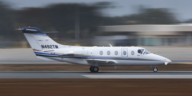 Beechcraft Beechjet (N492TM) - Private Plane taking off on Foggy Morning in Sarasota, Fl.