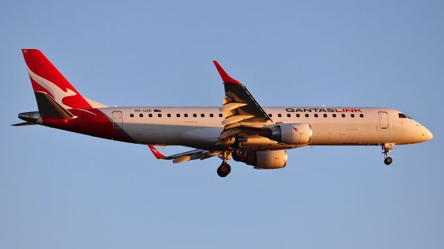 Embraer ERJ-190 (VH-UZK) - VH-UZK seen on short finals for runway 23 at Adelaide Airport {ADL/YPAD} on new years day after a flight from Canberra Airport {CBR/YSCB} as "Qantas 1979" right on sunset.
