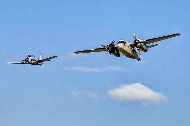 Grumman C-1 Trader (N778SR) - A T-28 Trojan and C-1 Trader make a pass at LaGrange Callaway Airport in LaGrange, Georgia.