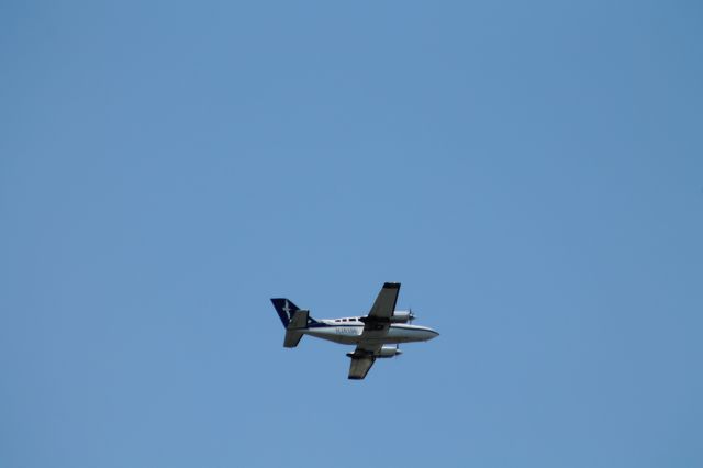 Cessna 402 (N26156) - Cape Air Cessna 402 turns left after taking off from 4L at Logan.