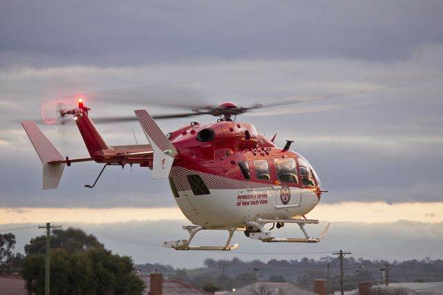 KAWASAKI EC-145 (VH-SYG) - Eurocopter EC145, operated by CHC Helicopters for Ambulance Service of New South Wales, taking off from the Duke of Ken Oval Helipad.