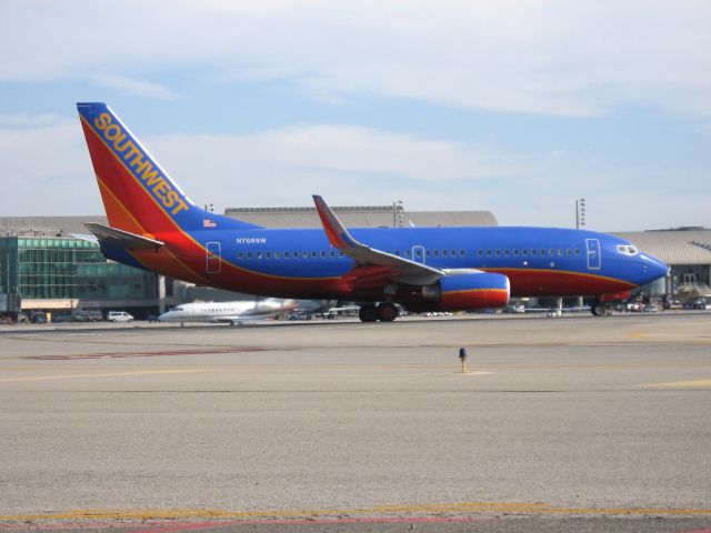 Boeing 737-700 (N768SW) - Holding on RWY 19R