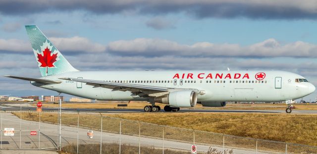 BOEING 767-300 (C-FTCA) - AC614 at the holding point for 06L bound for Halifax