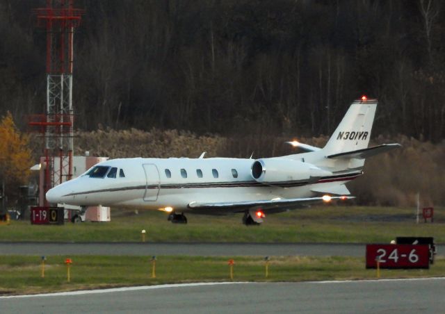 Cessna Citation Excel/XLS (N301VR) - N301VR taxiing down Quebec to runway 24 at KTEB, headed for KBED (43 minutes Flight Time)