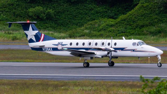 Beechcraft 1900 (N126AX) - Alaska Central Express AER144/KO144 from Anchorage (PANC/ANC) lands on runway 26. Photo date: 6-22-25br /Upload date: 6-25-25