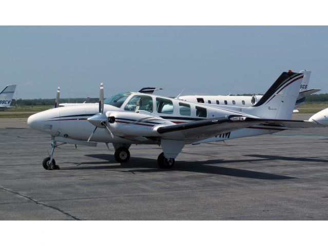 Beechcraft Baron (58) (N8111M) - At the restaurant parking.