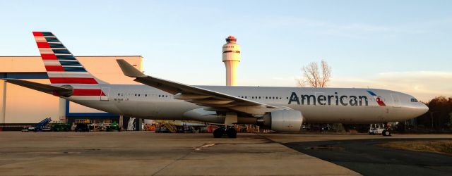 Airbus A330-300 (N276AY) - N276AY sitting at the hanger waiting for its next flight with the new ATC tower behindbr /br /2/24/19