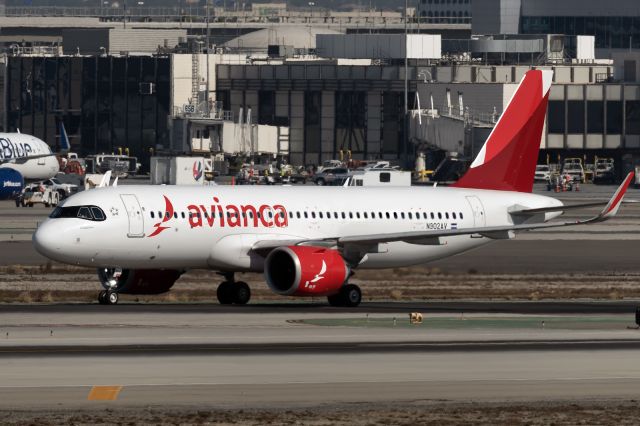 Airbus A320neo (N902AV) - 11th November, 2024: Avianca El Salvador taxiing to the gate after touching down on runway 25L at LAX.