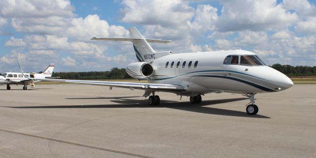 Hawker 800 (N512WC) - A Raytheon Hawker 800XP taxiing on the ramp at Pryor Field Regional Airport, Decatur, AL - September 19, 2016.