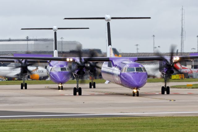 de Havilland Dash 8-400 (G-FLBC) - BEE7211, G-FLBC leading G-JEDT and waiting to line up for departure to Dusseldorf.