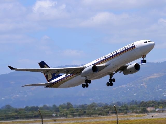 Airbus A330-300 (9V-STQ) - Getting airborne off runway 23 and heading home to Singapore. Monday 19th Dec. 2011