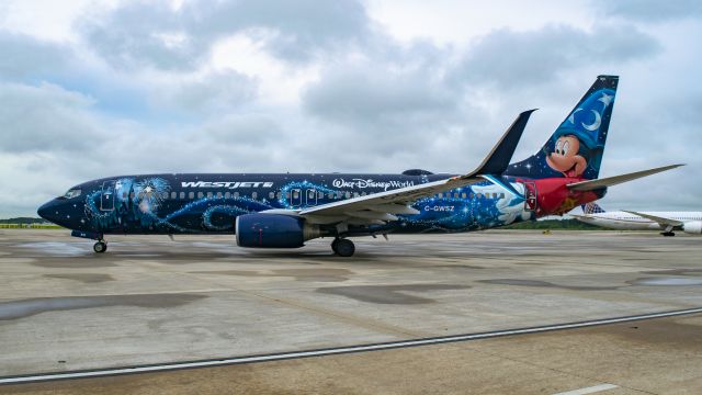 Boeing 737-800 (C-GWSZ) - WestJet Disney beginning taxi to runway 9 KIAH.