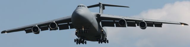 — — - C-5 doing touch and go maneuvers at Bangor Intl.