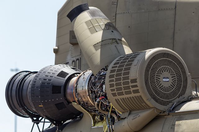 ASAP Chinook — - An Army, CH-47F, CHINOOK, with access panels revealing the inner workings of the starboard turbine engine.