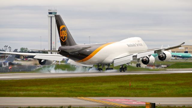 BOEING 747-8 (N627UP) - BOE690 touches down on Rwy 16R to complete a ferry flight from KPDX on 5.3.21. (B747-8F / ln 1564 / cn 65780).