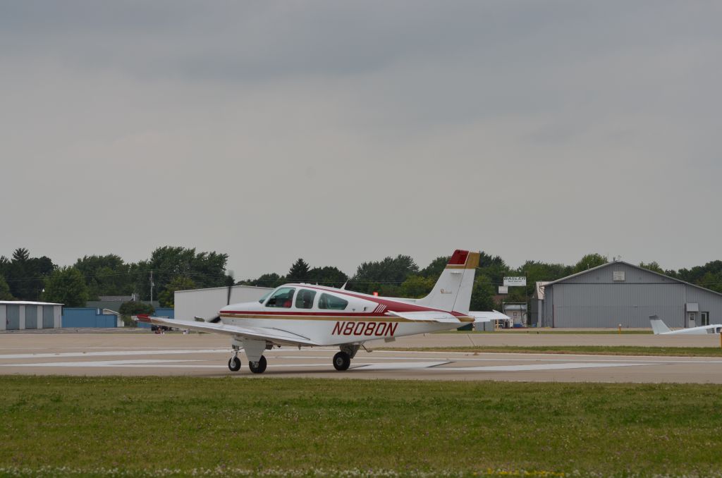 Beechcraft Bonanza (33) (N8080N) - Bonanza Mass Arrival at Oshkosh AirVenture 2014.