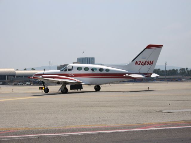 Cessna Chancellor (N2688M) - Holding short of RWY 19R