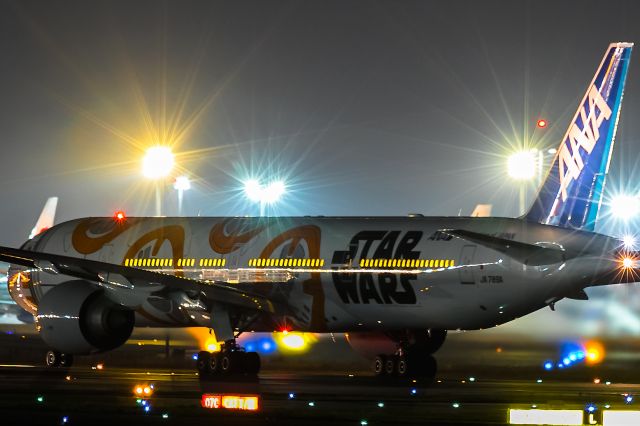 BOEING 777-300 (JA789A) - difficult to snap, 1 mile away and many backlight