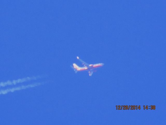 Boeing 737-700 (N7737E) - Southwest Airlines flight 784 from PHX to CLE over Southeastern Kansas at 39,000 feet.