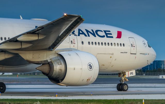 BOEING 777-200LR (F-GSPE) - Lining up on 06L for departure to Paris