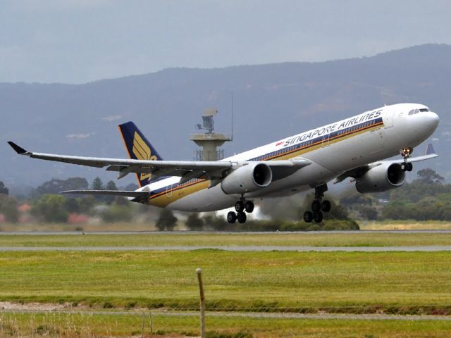 Airbus A330-300 (9V-STI) - Getting airborne off runway 23 and heading home to Singapore. Friday 5th October 2012.