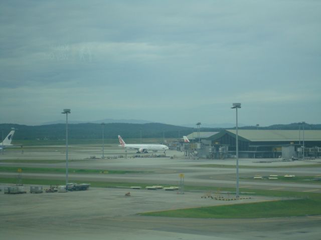 BOEING 777-300 (VH-VPE) - TAKEN FORM THE KLIA VIEWING GALLERY. SUPRISED TO SEE A VIRGIN OZ JET