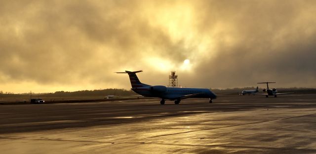 Embraer ERJ-145 — - Sunset over a E145 br /br /12/15/18