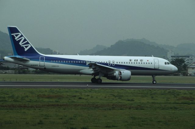 Airbus A320 (JA8383) - Landing at Matsuyama Intl Airport on 1991/05/11