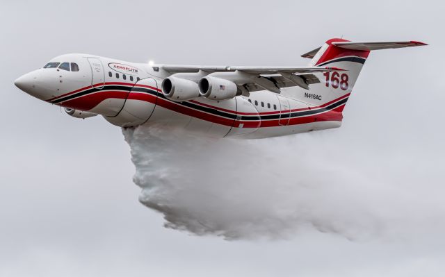 Avro Avroliner (RJ-85) (N416AC) - T168 cleaning the tanks during Winter MX at Spokane