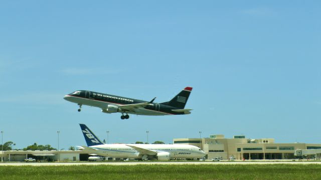 N787 — - US Airways plane takes to the air, as Boeing Dreamliner awaits her chance!