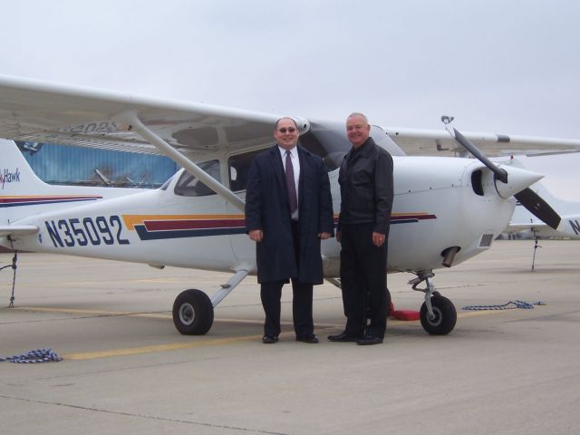 Cessna Skyhawk (N35092) - The new pilot with flight instructor Ric Menendez.
