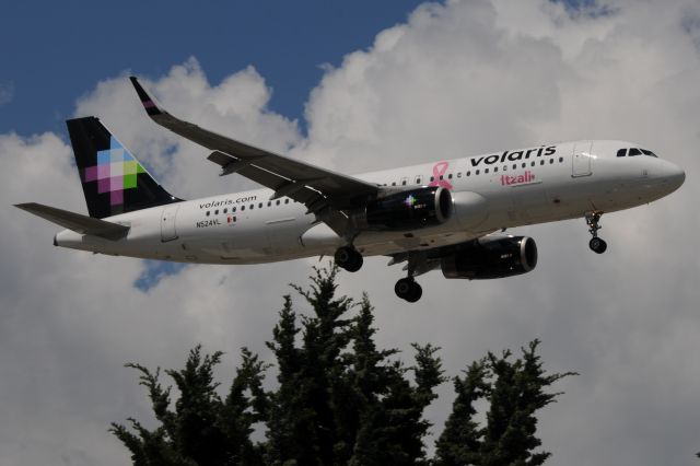 Airbus A320 (N524VL) - Pink Breast Cancer ribbon. Aircraft name Itzali!