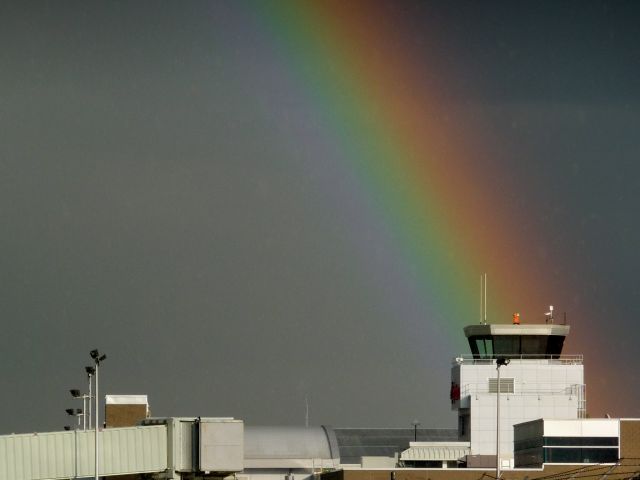 — — - CYXU/YXU Terminal tower after thunderstorm.