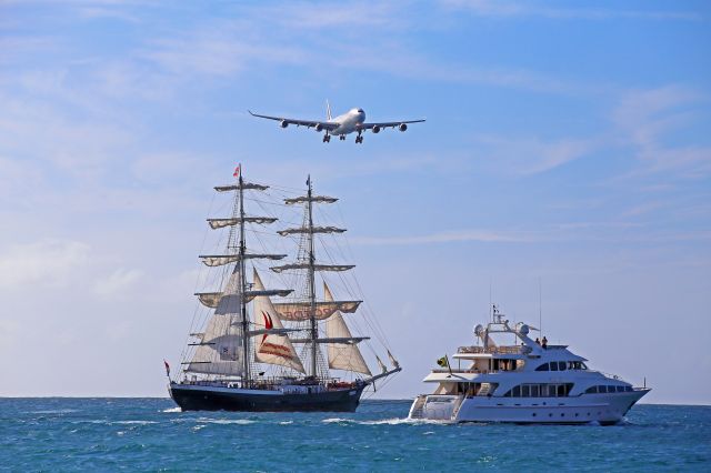 Airbus A340-300 (F-GLZU) - From Maho Beach. Spotting location on the boats...