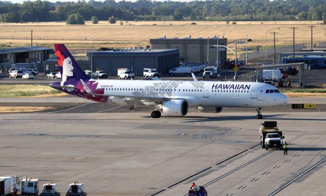 Airbus A321neo (N220HA) - KSMF - Finally caught a Hawaiian A321n after a 3 hr drive south arriving at Sacramento, I had the perfect angle, until the ramp monster showed up. The A321 was on a slow Taxi...so I had to take what I could get. This jet arriving LIH-SMF on 6/27/2025. after this photo I drove to the north end to get arrival shots but the entire area is posted no parking...thought I was at SJC for a moment....but being cagey I was able to park and get a few shots  then left.