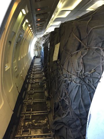 Boeing 737-200 (C-FNVK) - View of the cargo area inside C-FNVK. Note the overhead lighting and controls are still in place in each isle.