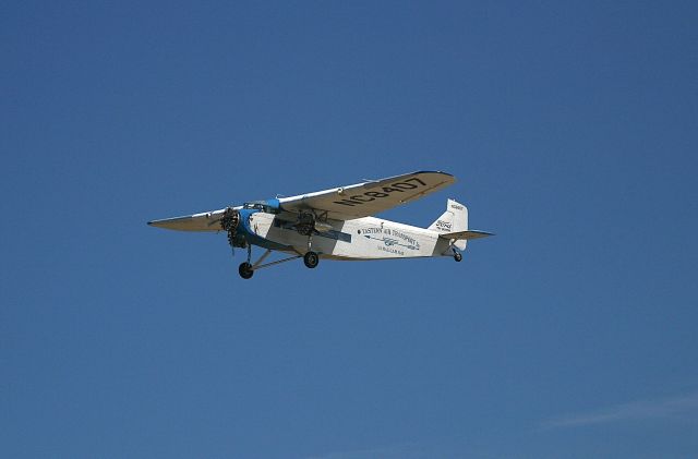 Ford Tri-Motor (NC8407) - EAA Ford Tri-motor during a fly by at the EAA Fly In 7-29-2005