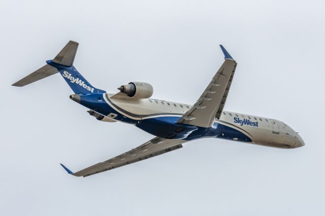 Canadair Regional Jet CRJ-700 (N741EV) - A SkyWest CRJ700 taking off from PHX on 3/11/23. Taken with a Canon R7 and Canon 100-400 EF L II lens.