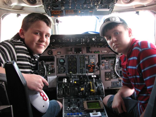 McDonnell Douglas MD-88 — - ME(on the right) and my twin brother in the flight deck of a MD-88 after a short flight of KBWI-KATL