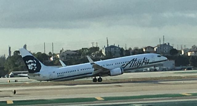 — — - Standing at the end of the International Concorse at LAX