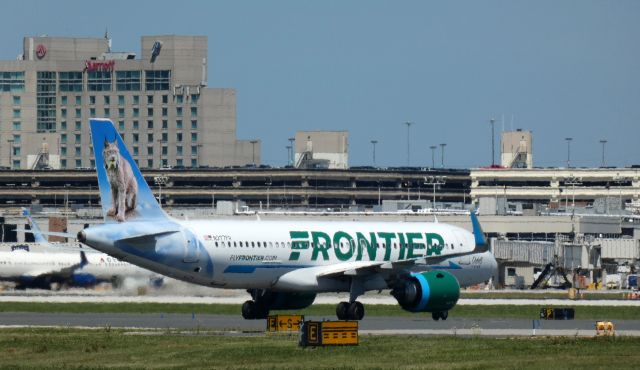 Airbus A320neo (N377FR) - Taxiing to the terminal is this 2021 Frontier Airlines Airbus 320-251N with "Odell" the Lynx looking on in the Summer of 2022.