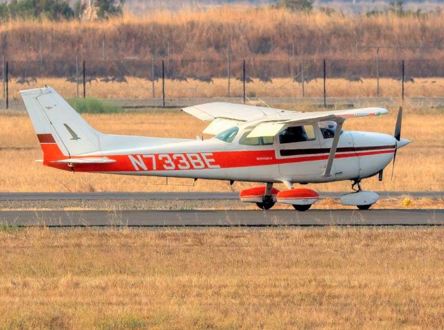 N733BE — - Flying Particles' Cessna 172N at Livermore Municipal Airport with turkeys grazing in the background. Livermore CA, August 2020