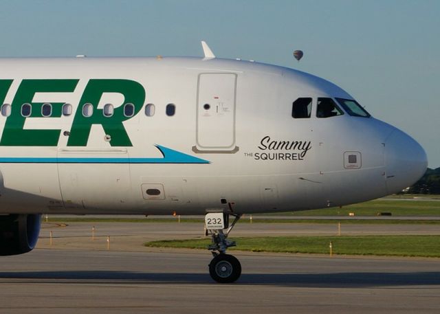 Airbus A320 (N232FR) - Look closely and youll see slower traffic above the flight deck.