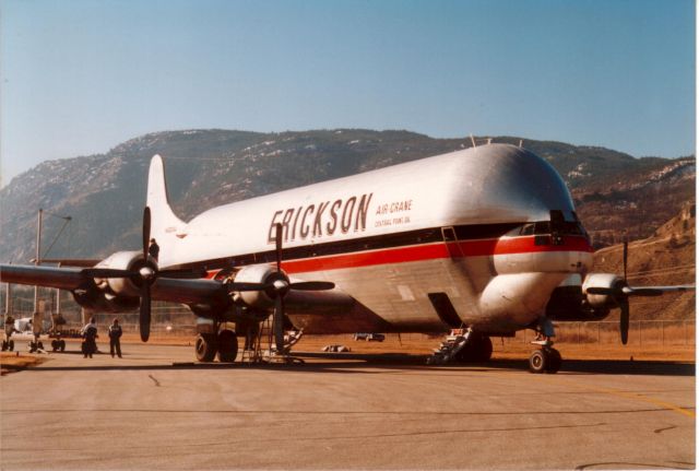 N422AU — - Erickson Boeing Straocruiser Guppy at Penticton BC Canada CYYF - Brought Skycrane S64 helicopter to remove another helicopter from a mountain. 1990